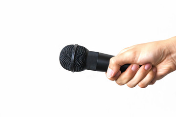Male hand with microphone on isolated white background. Business and public speech concept