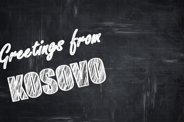 Chalkboard background with chalk letters: Greetings from kosovo