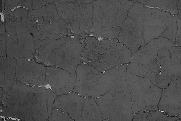 Wall fragment with attritions and cracks