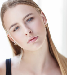 Fototapeta premium Portrait of young blond woman.