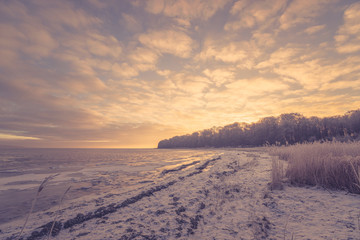 Fototapeta na wymiar Frozen sea in the morning sunrise