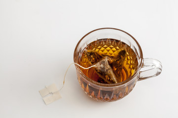 hot tea clear glass white background