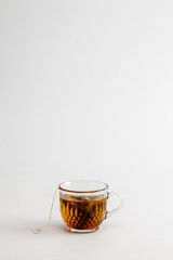 hot tea clear glass white background