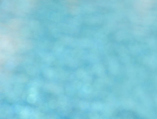 Fototapeta na wymiar Blur blue water bokeh background