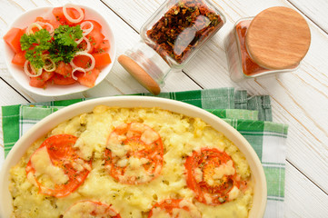 Casserole with minced meat, vegetables and cheese.