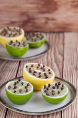 Lemon and limes with cloves, natural insect repellent
