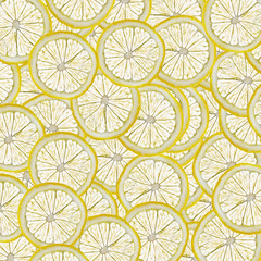 Abstract background with slices of fresh lemon. Seamless pattern for a design. Close-up. Studio photography