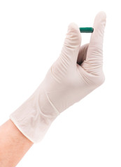 Pill in doctor's hand