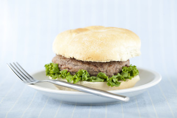 plate of burger sandwich with fork