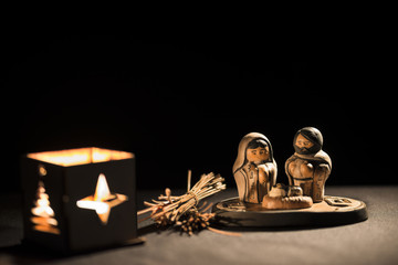 Christmas scene with figurines including Jesus, Mary and Joseph