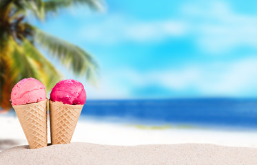 Fototapeta na wymiar Frozen Ice-cream. Strawberry ice creams in cone with tropical beach background. Summer concept