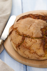 corn bread on napkin with knife