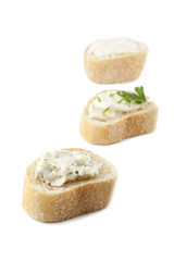 slices of baguette bread with butter spreads