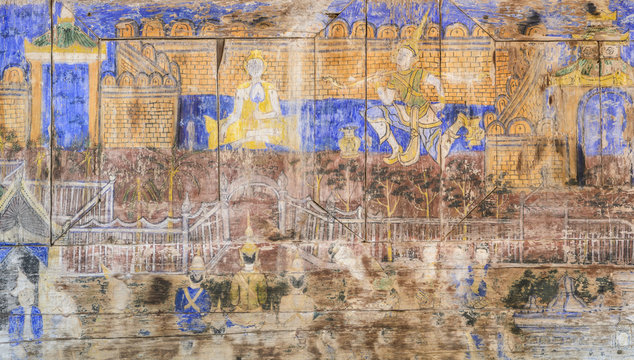 Ancient Thai mural painting on wooden temple wall