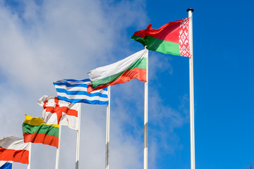 Obraz premium Flag of the Republic of Belarus and foreign countries against th