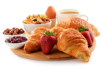 Breakfast on the cutting board isolated on white