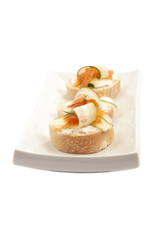 slices of bread with smoked salmon and butter