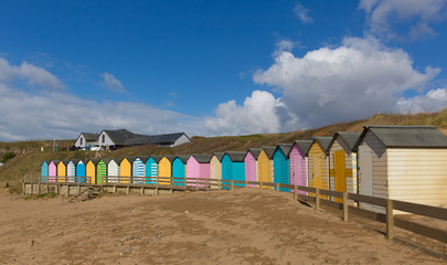 Bude North Cornwall England uk colourful pastel beach huts on the beach