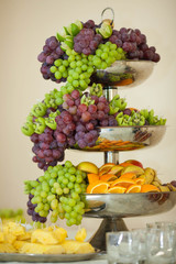  amazing tasty fruits  buffet table prepering wor party on  the