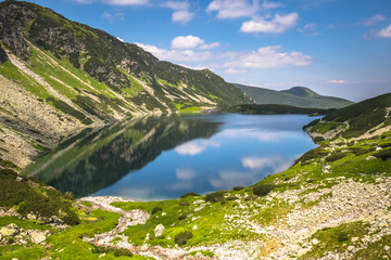 Fototapeta na wymiar Beautiful landscape of Black Pond Gasienicowy in Tatra Mountains