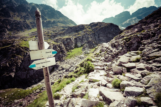 Direction sign on mountain trail, High Tatras, Poland