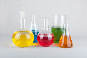 Chemical glasswares with color liquid on white background