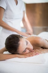 Obraz na płótnie Canvas Close-up of woman receiving spa treatment 
