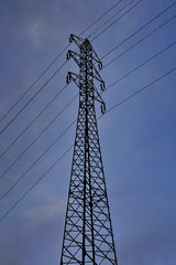 Tall electricity pylon leading high electric current