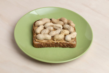 peanut butter sandwich and peanuts