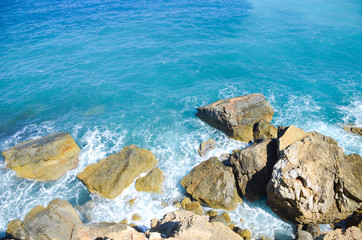 Fototapeta na wymiar a place where the shore meets the blue sea