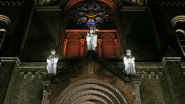Various night lighting of the Roman-Catholic Cathedral Millenium located in Traian Square, Timisoara, Romania.Details. 4K footage.
