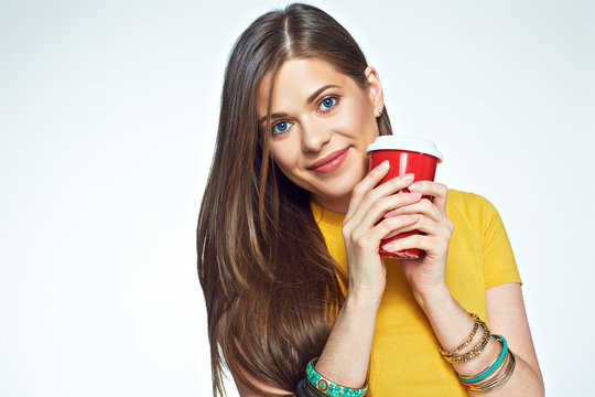 Close up face portrait smiling girl holding coffee cup.