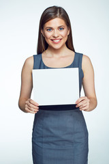 Fototapeta premium Smiling business woman hold white sign board.