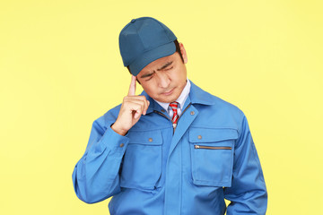 頭痛を訴える作業員