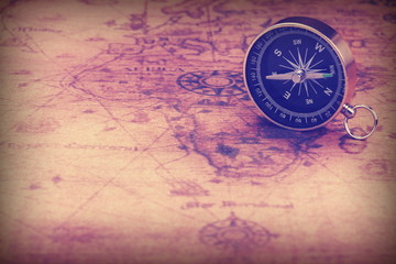 Fototapeta na wymiar Close Up Of Magnetic Compass On The Old Map
