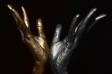 Male hands with metallic make-up