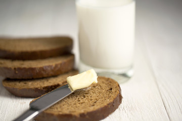 slice of bread, butter and milk