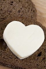 heart shaped butter on bread