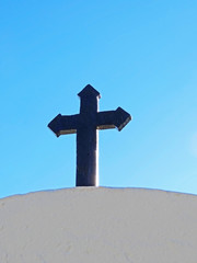 Cross and clear blue sky