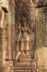 Ancient bas-reliefs on temple in Cambodia