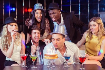 Happy friends celebrating birthday