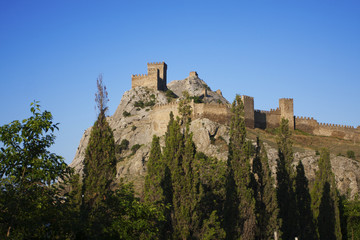 Fototapeta premium Castle stands high in the mountains
