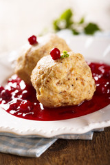 German dumplings with berries sauce