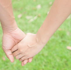 Couple in love holding hands, Friendship and love concept betwee