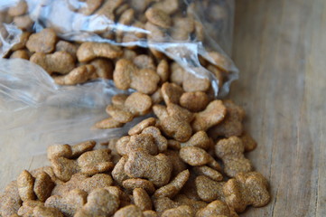 dog food pour from plastic bag