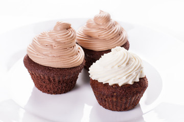 chocolate cupcake on white plate