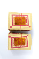 Chinese Joss Paper, traditional for passed away ancestor's 

spirits with selective focus. (ghost money for Chinese dead 

people) Calligraphy means money.