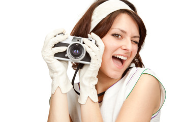 beautiful vintage girl take photograph with old camera isolated on white