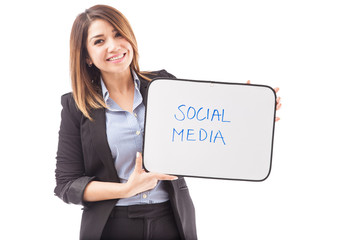 Happy businesswoman with text SOCIAL MEDIA