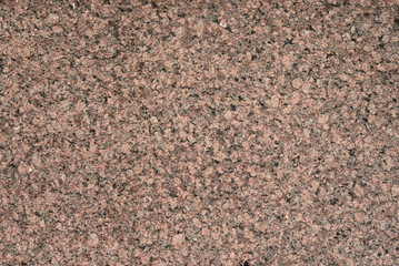 Red granite background.